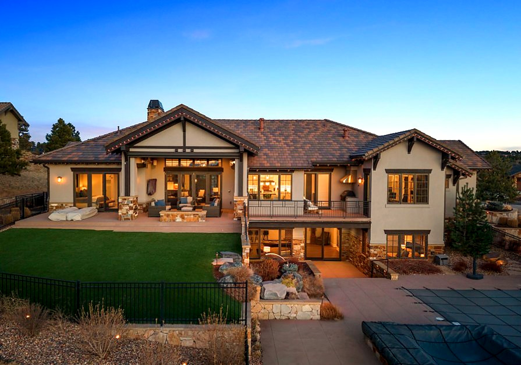 Luxury home exterior at dusk in the Denver Front Range