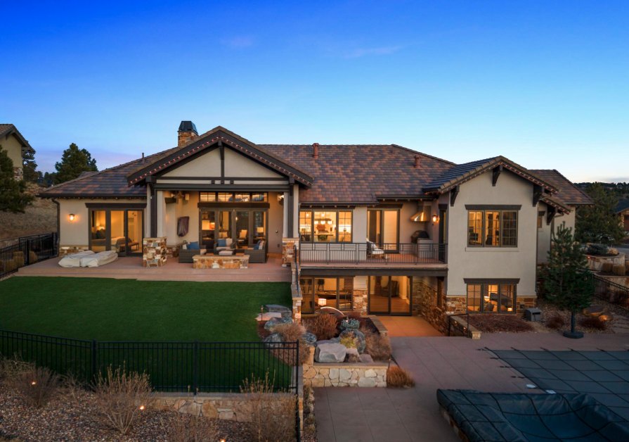 Luxury home exterior at dusk in the Denver Front Range